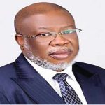 Dr Ehiogie West-Idahosa on black suit