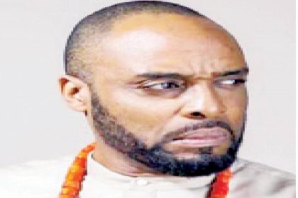 Kalu Ikeagwu with literature