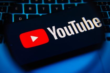 YouTube logo on a laptop keyboard