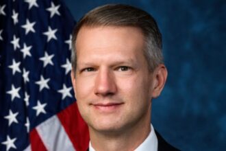 US legislator Moore on security United States congressman, Riley M. Moore smiling