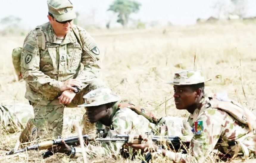 A US Army soldier seen training Nigerian soldier