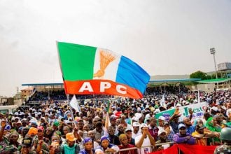 APC flag flying high at a gathering of party members