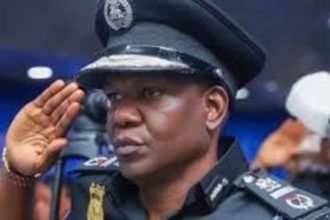 Frank Mba saluting