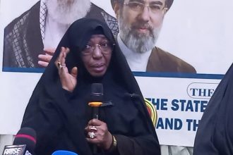 Zakzaky's wife holding a mic