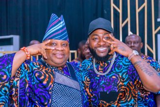 Afrobeats singer, Davido and uncle, Governor Ademola Adeleke