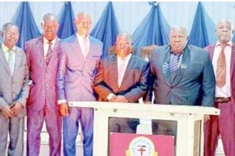 General Overseer of the Church of God Nigeria, Pastor Olubamiji Adeosun (fourth from right) flanked by the newly installed executives of the church, during the inauguration of the new executive members of the church, at the church headquarters in Beyaruka, Ibadan, Oyo State, last Friday.