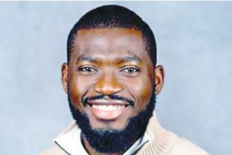 Olaitan smiling hydroelectric power