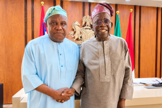 Senator Buhari in an handshake with President Tinubu