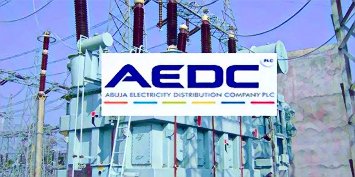 AEDC logo with background of electricity transformers,
