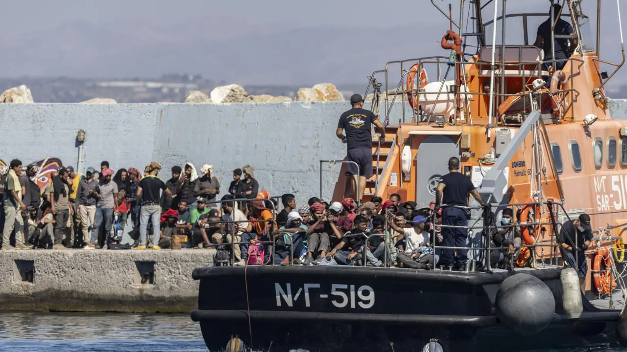 migrants on a boat,